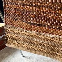 USED UNKNOWN WOVEN LEATHER RUG