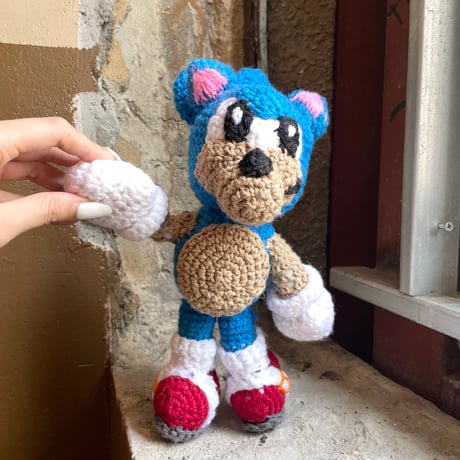 USED KNITTED STUFFED TOY