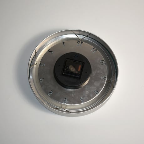 USED ALUMINUM FLAME WALL CLOCK