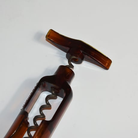 USED 70'S "SCREWPULL" PLASTIC BOTTLE OPENER