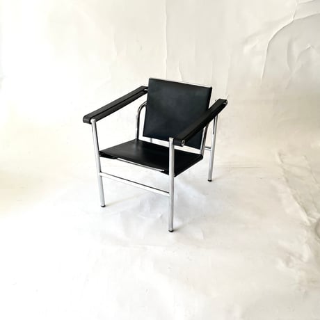 USED LEATHER SEAT STEEL FLAME LOUNGE CHAIR