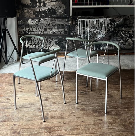 USED POSTMODERN METAL FRAME FABRIC STACKING CHAIR