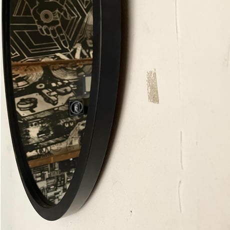 USED "UMBRA" RUBBER FLAME WALL MIRROR