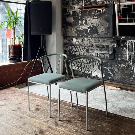 USED POSTMODERN METAL FRAME FABRIC STACKING CHAIR