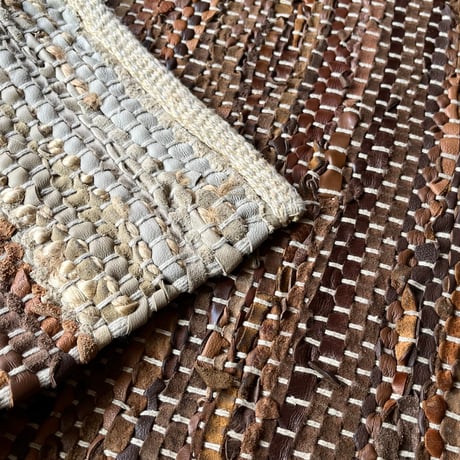 USED UNKNOWN WOVEN LEATHER RUG