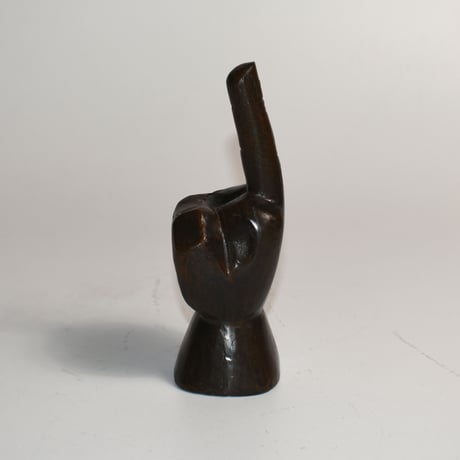 USED IRON FINGER STATUE