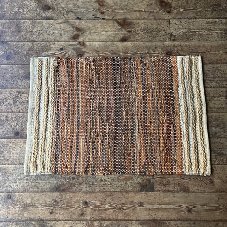 USED UNKNOWN WOVEN LEATHER RUG