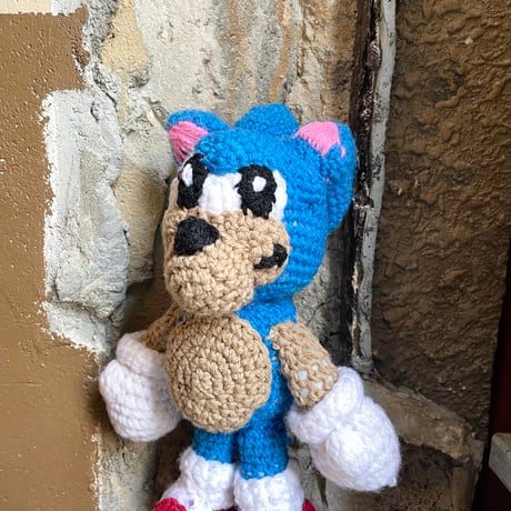 USED KNITTED STUFFED TOY