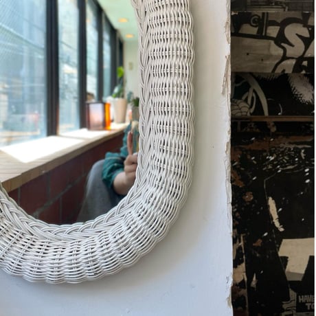 USED RATTAN FLAME WALL MIRROR