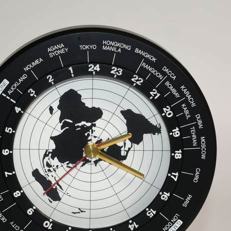 USED PLASTIC WORLD CLOCK