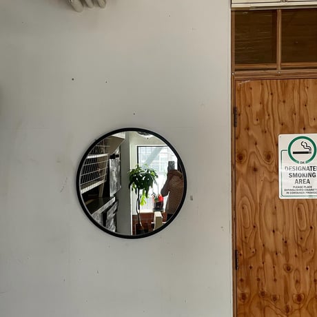 USED "UMBRA" RUBBER FLAME WALL MIRROR