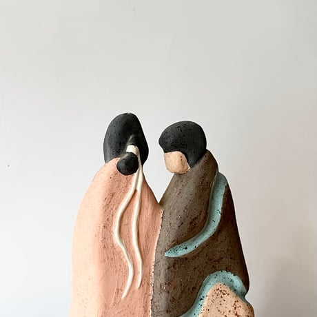 USED CERAMIC COUPLE STATUE