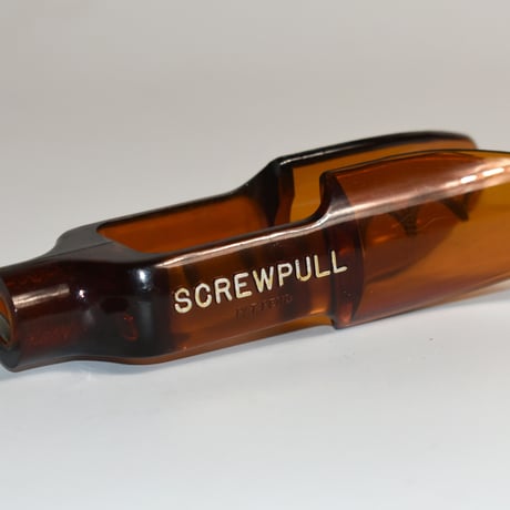USED 70'S "SCREWPULL" PLASTIC BOTTLE OPENER