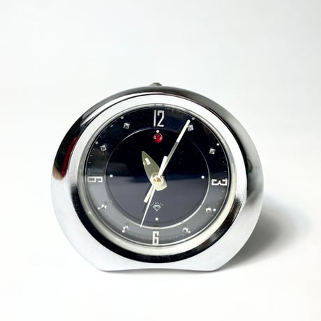 USED METAL FLAME ALARM TABLE CLOCK