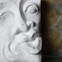 PLASTER FACE SCULPTURE