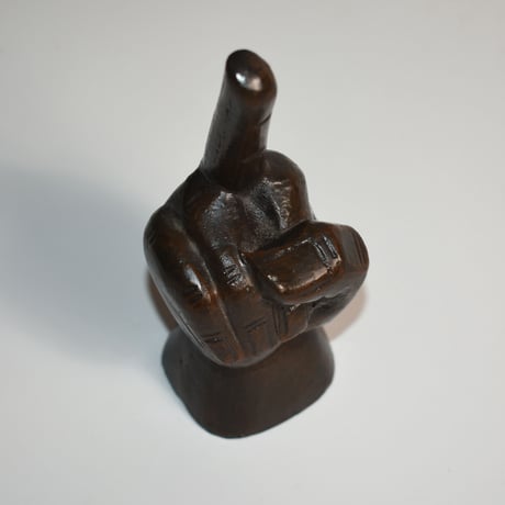 USED IRON FINGER STATUE