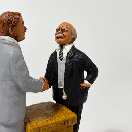 USED  80’S SALESMAN ORNAMENT