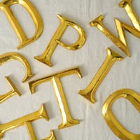 Gold Alphabet M