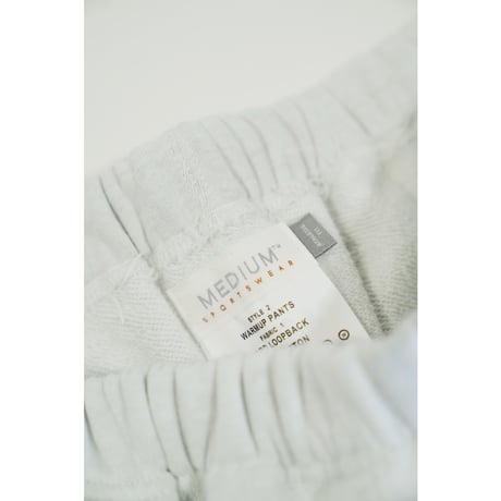 MEDIUM SPORTSWEAR WARMUP PANTS "HARD LOOPBACK"