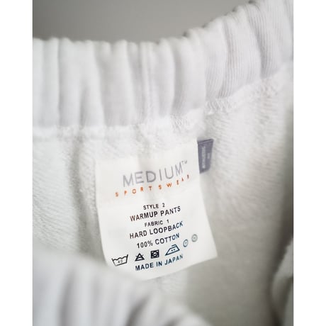 MEDIUM SPORTSWEAR WARMUP PANTS "HARD LOOPBACK"
