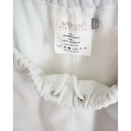 MEDIUM SPORTSWEAR WARMUP PANTS "HARD LOOPBACK"