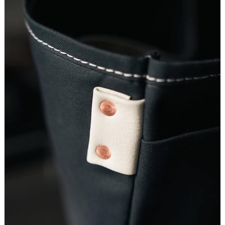 This is a(n) Ex. Leather Handle Base Tote L
