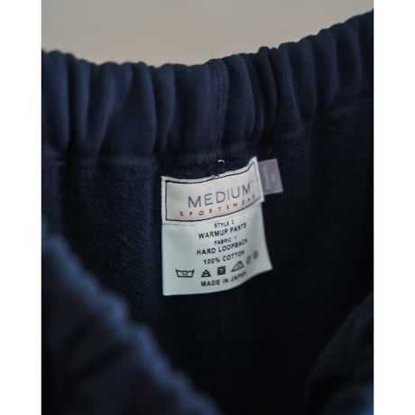 MEDIUM SPORTSWEAR WARMUP PANTS "HARD LOOPBACK"