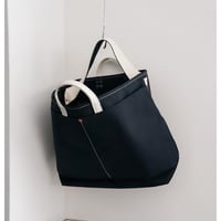 This is a(n) Ex. Leather Handle Base Tote L