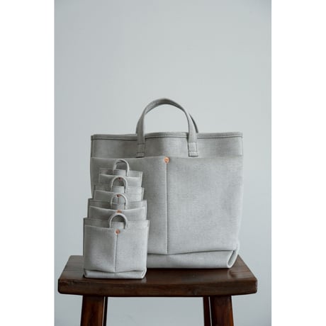 This is a(n) Ex. "Ultrasuede®"Miniature Base Tote Charm S/L