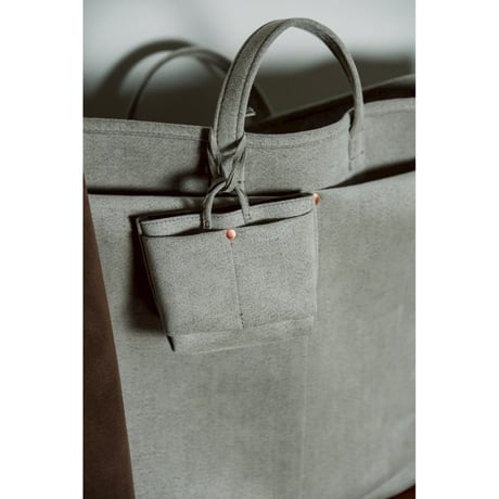This is a(n) Ex. "Ultrasuede®"Miniature Base Tote Charm S/L