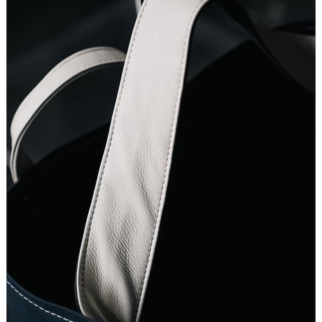 This is a(n) Ex. Leather Handle Base Tote L