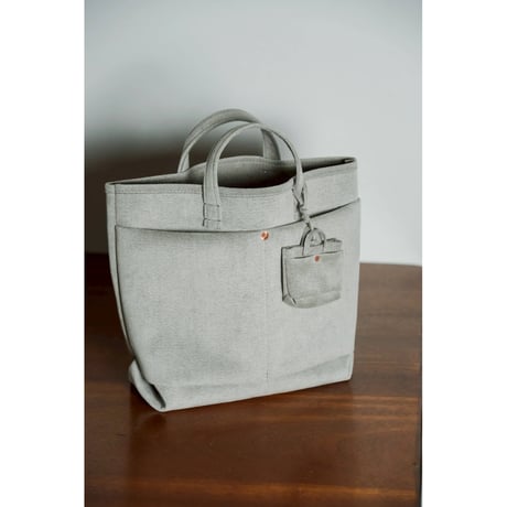 This is a(n) Ex. "Ultrasuede®"Miniature Base Tote Charm S/L