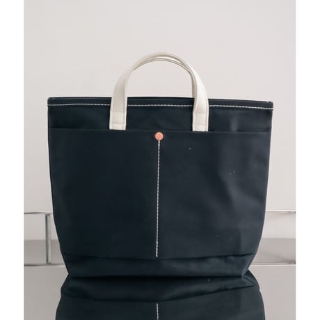 This is a(n) Ex. Leather Handle Base Tote S