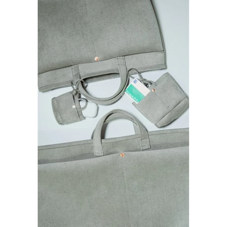 This is a(n) Ex. "Ultrasuede®"Miniature Base Tote Charm S/L