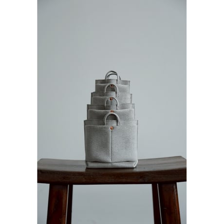 This is a(n) Ex. "Ultrasuede®"Miniature Base Tote Charm S/L
