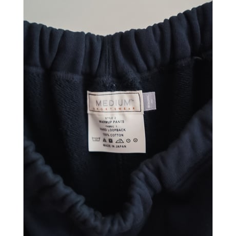MEDIUM SPORTSWEAR WARMUP PANTS "HARD LOOPBACK"