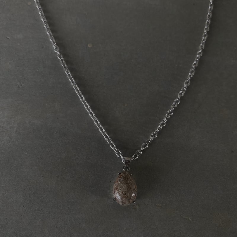 S)Drop dinosaur bone fossil necklace | Gemini