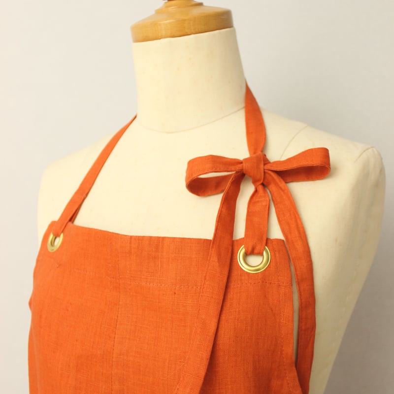 Eyelet switching apron】Orange | Rinyu