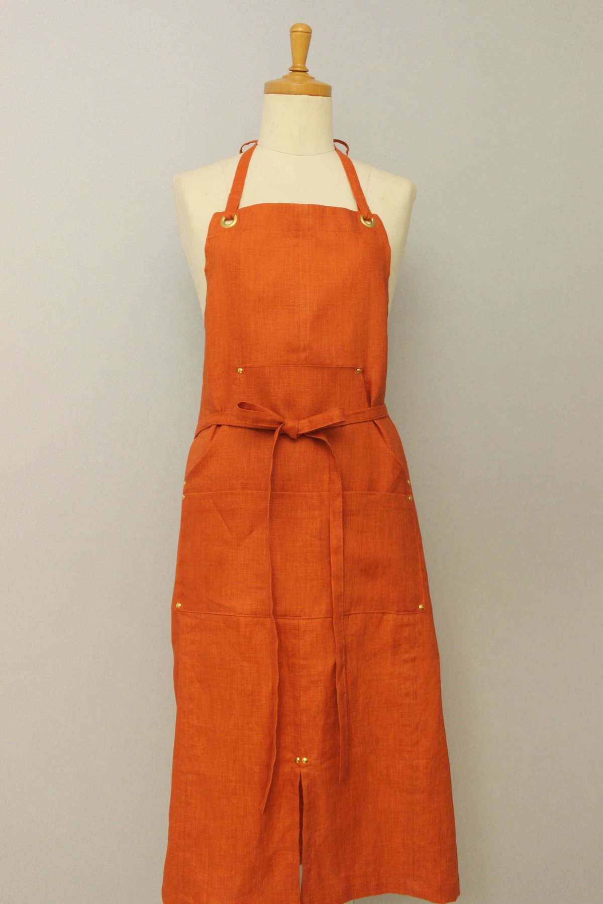 Eyelet switching apron】Orange | Rinyu