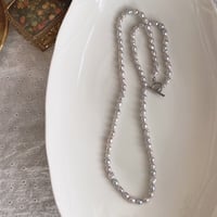 melette tete(メレット テテ)/ シルバー淡水パール ロングネックレス