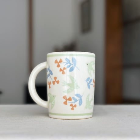 マグカップ“ヒワ鳥とオレンジのお花”/Mug"A Siskin and an Orange Flower"
