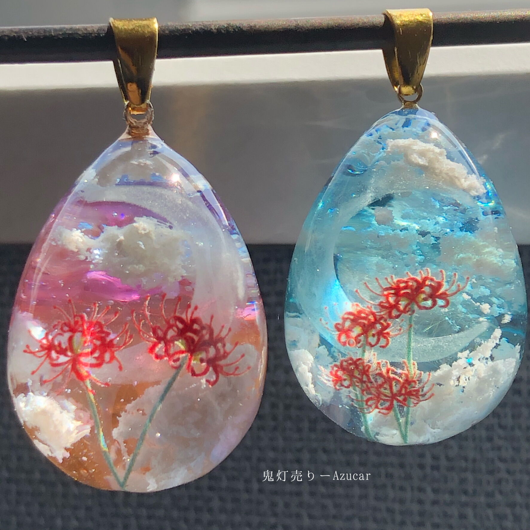 夜明け前の三日月と彼岸花の雲レジンとオルゴナイト 蓄光するたまご型