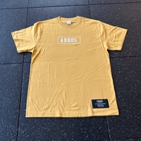 BOXロゴシャツ(ヘイジーイエロー×ホワイト)
