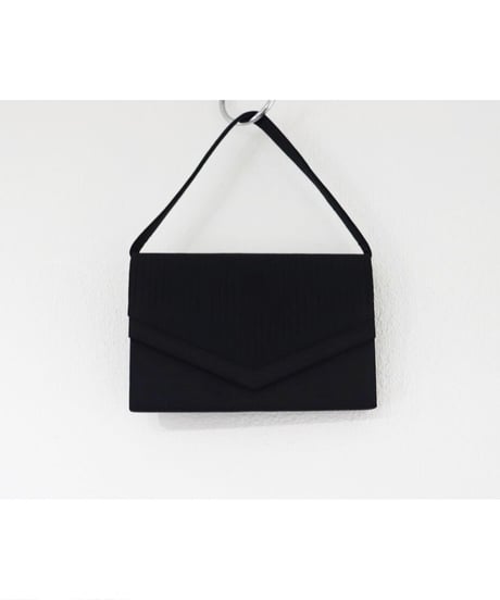 black formal hand bag