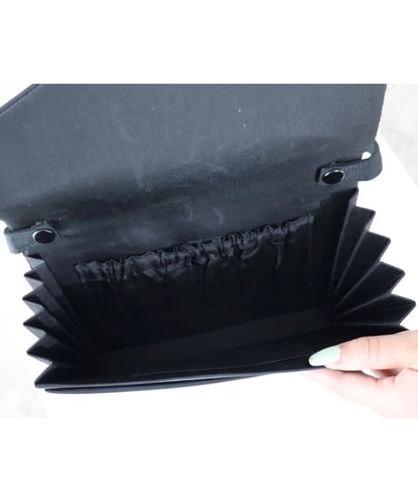 black formal hand bag