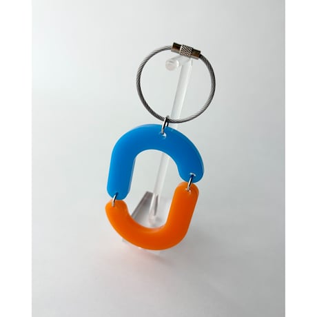 capsule key charm