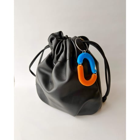 capsule key charm