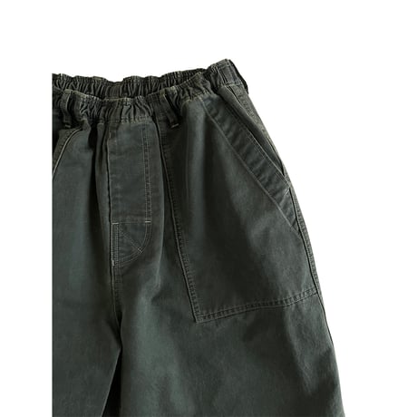 COMFORTABLE REASON / BOTANICAL WAX AGING SHORTS / RUST GREEN
