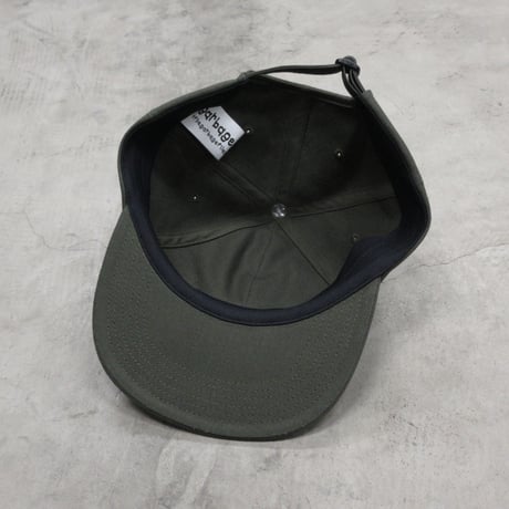 GARBAGE / HARD BRIM 6 PANEL CAP LOW (SOLIDARITY) / OLIVE GREEN (WHITE EMB)