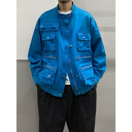 1980's-1990's Turquoise blue multi pocket design jacket